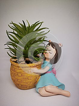 One of the home artifacts is the child thickened with plants to decorate tables and windows photo