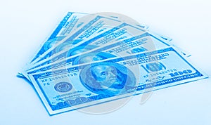 One hunderd US dollar banknotes on white background. buckes