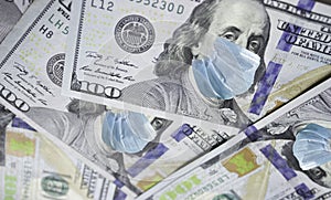 One Hundred Dollar Bill With Medical Face Mask on Benjamin Franklin. Coronavirus affects global stock market. World economy hit by