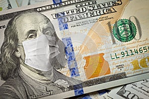 One Hundred Dollar Bill With Medical Face Mask on Benjamin Franklin