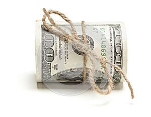 One Hundred Dollar Bill Roll Tied in Burlap String on White