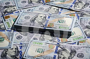 One hundred dollars bills paper money background
