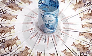 One hundred reais banknote and two hundred reais banknotes, money from brazil, conceptual image for the economy of brazil