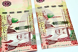 100 one hundred Saudi riyals banknotes features prophet's mosque in Medina and portrait of king Salman Bin AbdelAziz photo