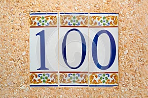100 (one hundred) tile numbered photo