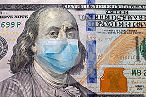 One hundred us dollars bill with face mask. Coronavirus covid outbreak concept