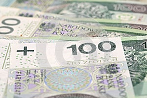 One hundred zlotys for graphic projects.