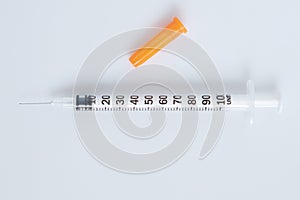 One Hypodermic syringe on white background