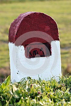 One kilometer marking stone photo