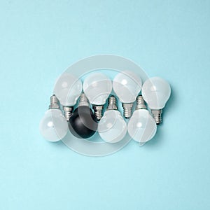 One light bulb outstanding, glowing different. business creativity idea concepts. flat lay design