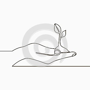 One line drawing of sprout in hand. Continuous line growing plant in hand palm. Hand-drawn illustration. photo