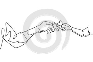 One line drawing of two hands holding puzzle pieces and want to merge together. Father or mother and son teamwork to build super