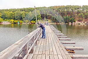 Old wooden pedestrian bridge. Beloretsk. Bashkortostan photo