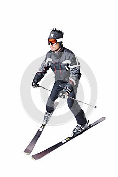 One male skier skiing with full equipment on a white background