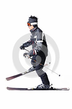 One male skier skiing with full equipment on a white background