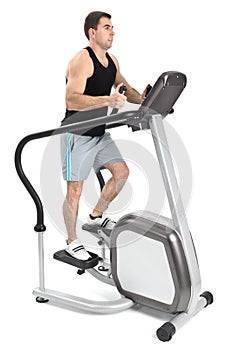 One man doing step machine exercise