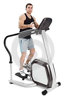 One man doing step machine exercise