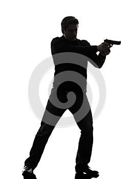 Man killer policeman aiming gun standing silhouette photo