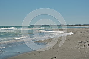 One of the many beaches of Pacific Ocean near city of Okarito on New Zealand