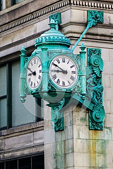 One the many clocks that decorate downtown Chicago, Illinois, USA