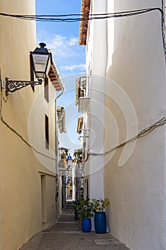 One of the many old typical Spanish streets Calle Collada in Requena, Spain photo