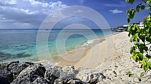 One of many white sand beaches with lazur ocean in the Speightstown town, located on the west coast of island Barbados, Caribbean photo