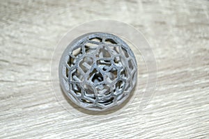 One model black printed on 3D printer. Black object printed on 3D printer
