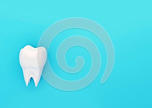 One molar tooth on blue backdrop