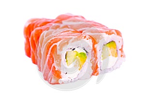 One or more maki rolls in a row with salmon, avocado, tuna and cucumber isolated on white background. Fresh hosomaki pieces with r