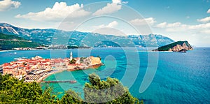 One of the most attractive city of Montenegro - Budva, old medieval town on the coast of Adriatic sea. Aerial summer panorama of M