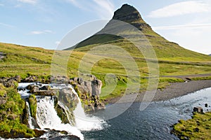 One of the most popular waterfall on Iceland - Kirkjufellsfoss on snaefellsnes peninsula, Iceland in summer