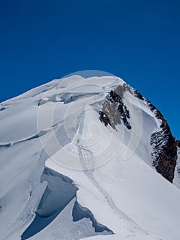 One mountaineer on a dangerous path to the Mont Blanc.