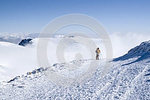 One mountaineer in snow winter mountain, Bulgaria