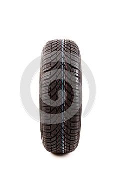 One new tire isolated on white background