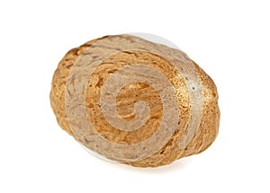 One nutmeg isolated on a white background