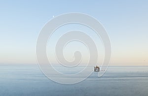 One oceanographer stands on the sea. Sea background landscape