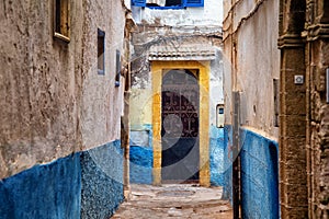 One of old door in the  one of the historical narrow streets in the medina of Essaouira in Morocco