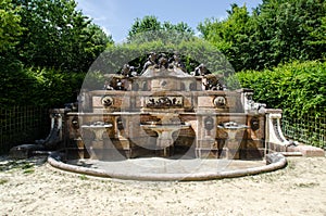 One of the old fountain in the park of Versailles