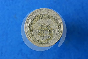 One old yellow coin five kopecks photo