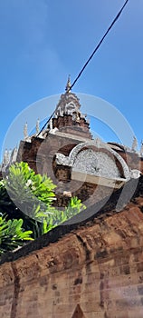 It is one of the oldest temples in Thailand. that use bricks in construction Adorned with peacocks and serpents