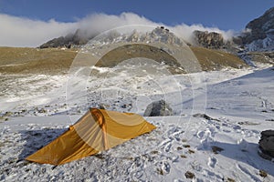 One orange tent