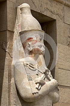 One of the Osirid pillars which stands along the upper terrace at the Mortuary Temple of Hatshepsut at Deir al-Bahri in Egypt.