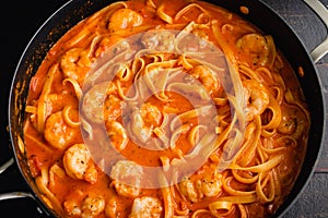 Shrimp and Pasta in Tomato Cream Sauce in a Saute Pan