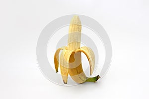 One peeled banana isolated