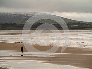 One person on a sandy Strandhill beach county Sligo, Atlantic ocean,