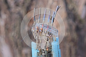 piece of a broken kinescope tube with gray wires photo