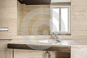 One-piece marble sink with porcelain insert, chrome faucet