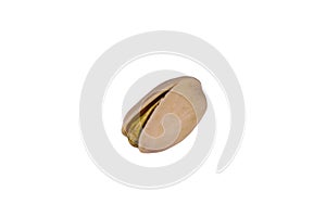 One pistachio nut isolated on the white background