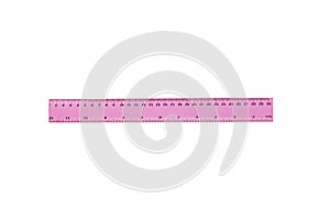 One plastic pink ruler with degrees and digits for education or work isolated on white background