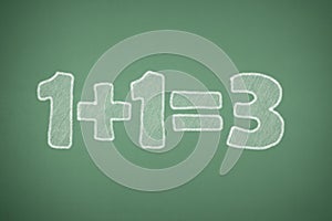 One plus one is three on blackboard